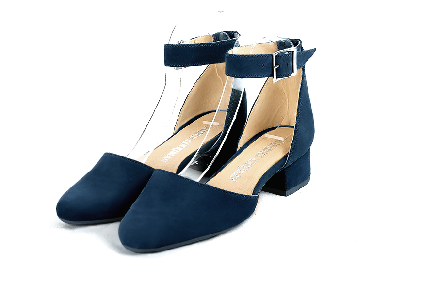 French elegance and refinement for these navy blue dress open side shoes, with a strap around the ankle, 
                available in many subtle leather and colour combinations. Its high vamp and high bracelet will give you good support.
The flange will be adapted to the size of your ankle.
To personalize or not, according to your inspiration and your needs.  
                Matching clutches for parties, ceremonies and weddings.   
                You can customize these shoes to perfectly match your tastes or needs, and have a unique model.  
                Choice of leathers, colours, knots and heels. 
                Wide range of materials and shades carefully chosen.  
                Rich collection of flat, low, mid and high heels.  
                Small and large shoe sizes - Florence KOOIJMAN